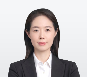 340x330_강승림 Professional headshot of a woman in a black blazer and white blouse facing the camera, neutral background.