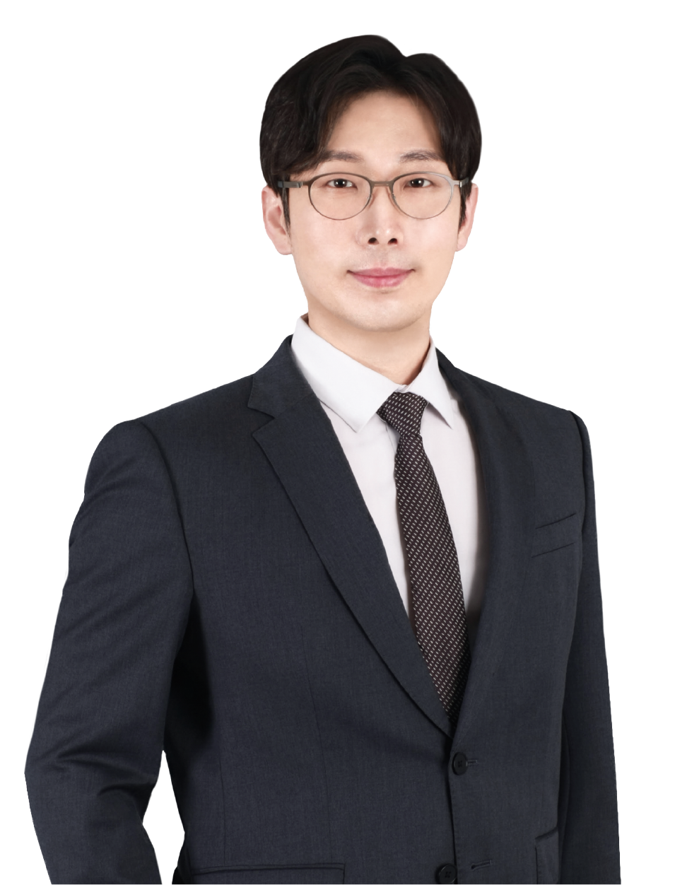 en_신무연 Professional portrait of a man in a dark suit, white shirt, and patterned tie, wearing glasses and facing the camera.